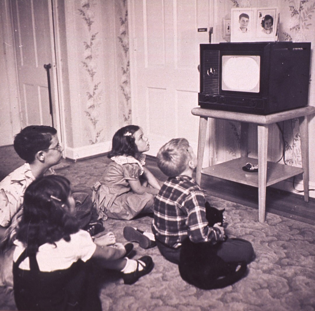 kids watching old television
